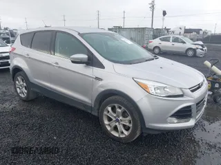 2013 Ford Escape SEL with VIN 1FMCU9H97DUD93157, listed as a IAAI auction lot 41955820 with 244,114 mi miles. Bid and sale history available at carsss.com. Image 1.