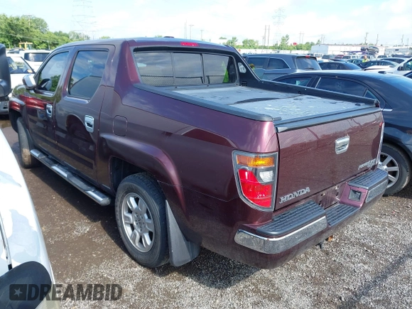 2007 Honda Ridgeline RTL with VIN 2HJYK16587H518901, listed as a IAAI auction lot 42762425 with 206,243 mi miles and . Bid and sale history available at DreamBid. Image 3.
