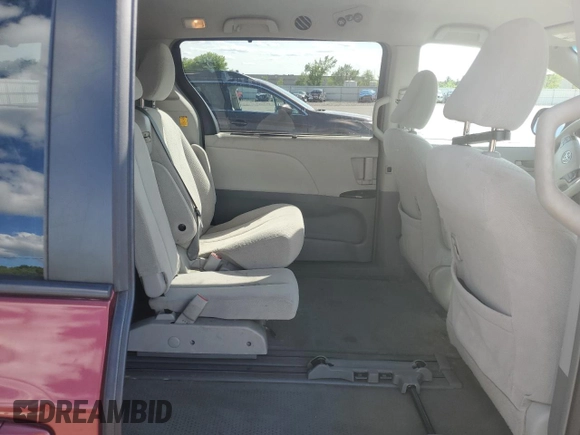 2012 Toyota Sienna LE AAS with VIN 5TDKK3DC7CS195590, listed as a Copart auction lot 57968415 with 201,732 mi miles and Salvage title. Bid and sale history available at DreamBid. Image 11.