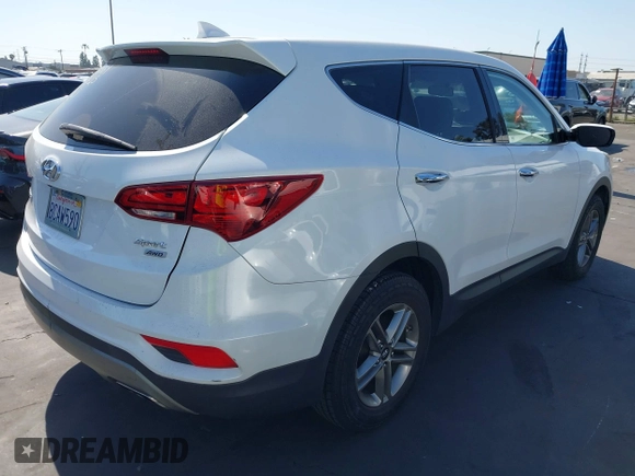 2017 Hyundai Santa Fe 2.4L z VIN 5XYZTDLB0HG403842, wystawiony jako IAAI lot #42206543 z przebiegiem 77 900 mil mil oraz . Historia ofert i sprzedaży dostępna na DreamBid. Obrazek 4.