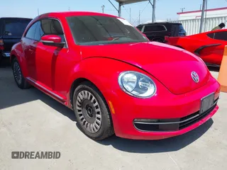 2013 Volkswagen Beetle 2.5L w/Sun with VIN 3VWJP7AT3DM659854, listed as a IAAI auction lot 42648894 with 198,695 mi miles and . Bid and sale history available at DreamBid. Image 1.