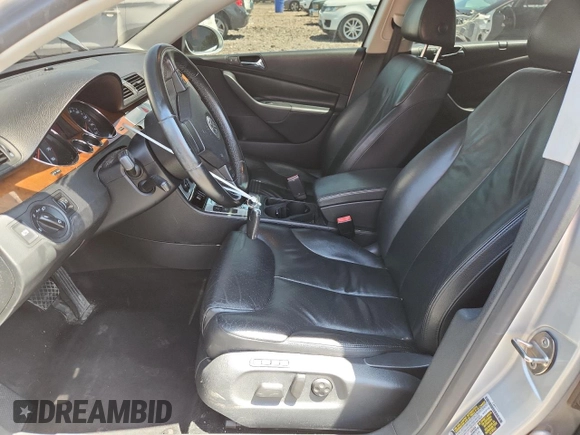 2008 Volkswagen Passat 2.0T with VIN WVWEK73C18P059608, listed as a Copart auction lot 61749825 with 147,963 mi miles and Salvage title. Bid and sale history available at DreamBid. Image 7.