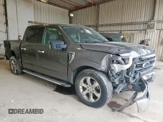 2021 Ford F-150 XL with VIN 1FTEW1CP1MFC04764, listed as a Copart auction lot 59572975 with 61,576 mi miles and Salvage title. Bid and sale history available at DreamBid. Image 4.