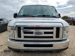 2014 Ford Econoline Passenger XL with VIN 1FBNE3BL4EDA25746, listed as a Copart auction lot 69606994 with 107,842 mi miles and Salvage Title. Bid and sale history available at carsss.com. Image 5.