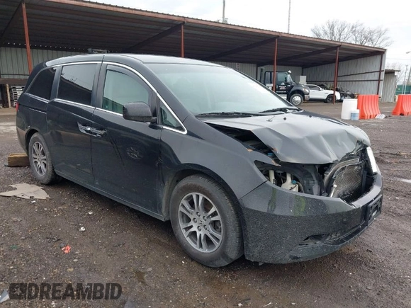 2012 Honda Odyssey EX with VIN 5FNRL5H46CB096547, listed as a IAAI auction lot 41919700 with 165,882 mi miles and . Bid and sale history available at carsss.com. Image 1.