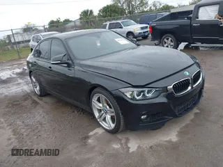 2013 BMW 3 Series 328i with VIN WBA3C1G52DNN93698, listed as a IAAI auction lot 41673985 with 160,233 mi miles. Bid and sale history available at carsss.com. Image 1.