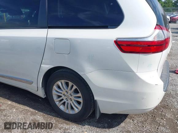 2016 Toyota Sienna XLE with VIN 5TDYK3DC4GS748888, listed as a IAAI auction lot 42605968 with 164,811 mi miles and . Bid and sale history available at DreamBid. Image 21.