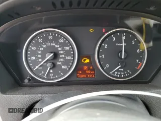 2012 BMW X5 35i z VIN 5UXZV4C51CL989449, wystawiony jako Copart lot #56762095 z przebiegiem 112 576 mil mil oraz Szkoda całkowita • Salvage title. Historia ofert i sprzedaży dostępna na DreamBid. Obrazek 9.