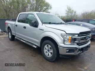 2019 Ford F-150 XL with VIN 1FTFW1E41KKC79802, listed as a IAAI auction lot 41953250 with 98,712 mi miles and . Bid and sale history available at DreamBid. Image 1.