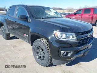 2021 Chevrolet Colorado 4WD Z71 with VIN 1GCGTDEN5M1183879, listed as a IAAI auction lot 41366138 with 163,748 mi miles. Bid and sale history available at carsss.com. Image 1.