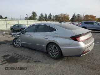 2020 Hyundai Sonata Hybrid Ultimate with VIN KMHL34JJ2LA010025, listed as a Copart auction lot 77657214 with 59,596 mi miles and Salvage Title. Bid and sale history available at carsss.com. Image 2.
