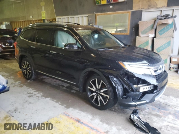 2020 Honda Pilot Touring 8-Passenger with VIN 5FNYF6H90LB043055, listed as a Copart auction lot 85194544 with 82,144 mi miles and Salvage Title. Bid and sale history available at DreamBid. Image 4.