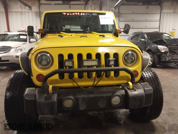2008 Jeep Wrangler X with VIN 1J8FA24108L597093, listed as a IAAI auction lot 42401363 with 215,424 mi miles and . Bid and sale history available at DreamBid. Image 13.