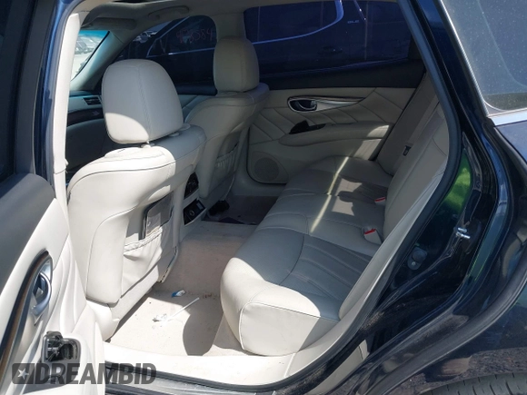 2015 Infiniti Q70 with VIN JN1BY1PP7FM601789, listed as a IAAI auction lot 41782519 with 140,158 mi miles and . Bid and sale history available at DreamBid. Image 8.