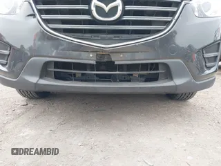 2016 Mazda CX-5 Sport with VIN JM3KE2BY4G0858100, listed as a IAAI auction lot 41368135 with 93,435 mi miles. Bid and sale history available at carsss.com. Image 6.