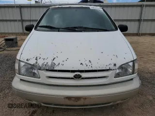 1999 Toyota Sienna LE with VIN 4T3ZF13C4XU134680, listed as a Copart auction lot 74044544 with 127,954 mi miles and Clean Title. Bid and sale history available at carsss.com. Image 5.