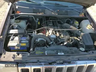 1998 Jeep Grand Cherokee Laredo z VIN 1J4FX58SXWC144715, wystawiony jako Copart lot #86423594 z przebiegiem 93 936 mil mil oraz Czysty tytuł • Clean title. Historia ofert i sprzedaży dostępna na DreamBid. Obrazek 14.