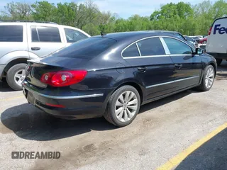 2012 Volkswagen CC Sport PZEV with VIN WVWMP7ANXCE507124, listed as a IAAI auction lot 42105616 with 128,873 mi miles. Bid and sale history available at carsss.com. Image 4.