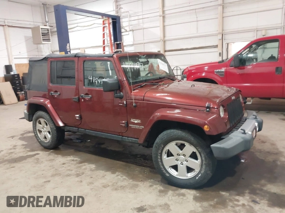 2008 Jeep Wrangler Unlimited Sahara z VIN 1J4GA59178L514002, wystawiony jako IAAI lot #41949717 z przebiegiem Nie podano mil oraz . Historia ofert i sprzedaży dostępna na DreamBid. Obrazek 13.