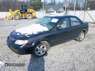 2002 Mazda Protege DX with VIN JM1BJ225620493468, listed as a IAAI auction lot 41367071 with 139,976 mi miles and . Bid and sale history available at DreamBid. Image 2.