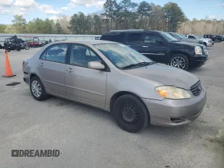2003 Toyota Corolla CE with VIN 1NXBR32E33Z185243, listed as a Copart auction lot 48849085 with 257,556 mi miles and Salvage Title. Bid and sale history available at DreamBid. Image 4.
