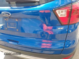 2019 Ford Escape SE with VIN 1FMCU0GD4KUB77720, listed as a IAAI auction lot 41681062 with 94,280 mi miles. Bid and sale history available at carsss.com. Image 18.