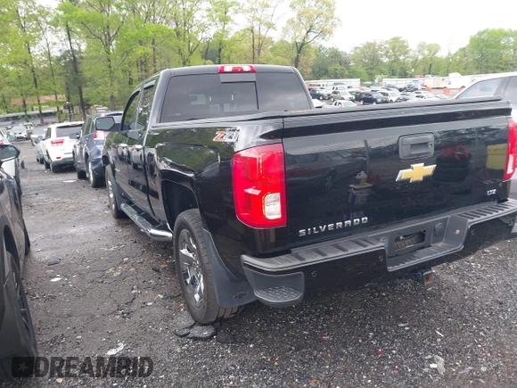 2017 Chevrolet Silverado 1500 LTZ with VIN 1GCVKSEC4HZ168701, listed as a IAAI auction lot 41975512 with 113,311 mi miles. Bid and sale history available at carsss.com. Image 3.