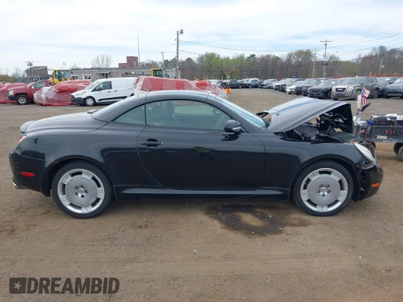 2002 Lexus SC 430 z VIN JTHFN48Y920032217, wystawiony jako IAAI lot #42091287 z przebiegiem 62 093 mil mil oraz . Historia ofert i sprzedaży dostępna na DreamBid. Obrazek 13.