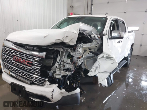 2021 GMC Canyon 4WD Denali with VIN 1GTG6EEN0M1229180, listed as a IAAI auction lot 41298304 with 55,865 mi miles. Bid and sale history available at carsss.com. Image 6.