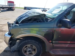 2000 Ford Excursion Limited z VIN 1FMNU43S5YEC18413, wystawiony jako IAAI lot #41972353 z przebiegiem 99 531 mil mil oraz . Historia ofert i sprzedaży dostępna na DreamBid. Obrazek 6.