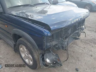2003 Land Rover Discovery with VIN SALTR16483A787662, listed as a IAAI auction lot 42140472 with 122,446 mi miles and . Bid and sale history available at DreamBid. Image 12.