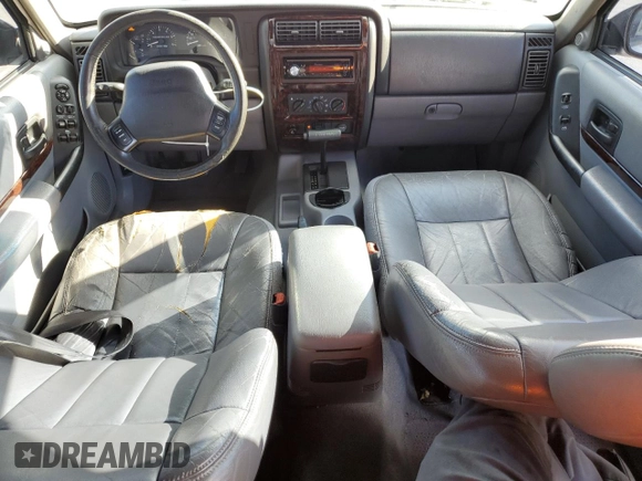 1998 Jeep Cherokee Sport with VIN 1J4FT68S7WL174028, listed as a Copart auction lot 73812524 with 0 mi miles and Salvage Title. Bid and sale history available at carsss.com. Image 8.