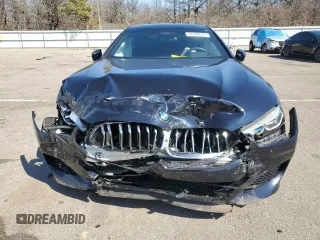 2020 BMW 8 Series M850i with VIN WBAGV8C02LCE34594, listed as a Copart auction lot 50389675 with 37,279 mi miles and Salvage title. Bid and sale history available at DreamBid. Image 5.