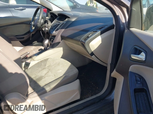 2012 Ford Focus SE z VIN 1FAHP3K23CL366865, wystawiony jako IAAI lot #42140894 z przebiegiem 168 754 mil mil oraz . Historia ofert i sprzedaży dostępna na DreamBid. Obrazek 5.