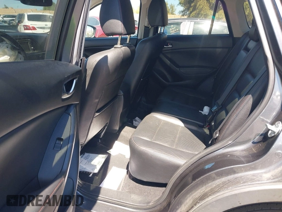 2014 Mazda CX-5 Grand Touring with VIN JM3KE4DY8E0391317, listed as a IAAI auction lot 41871641 with 77,048 mi miles. Bid and sale history available at carsss.com. Image 8.