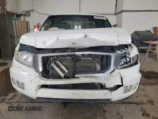 2012 Honda Ridgeline RTL with VIN 5FPYK1F59CB501178, listed as a Copart auction lot 60634535 with 165,766 mi miles and Salvage title. Bid and sale history available at DreamBid. Image 5.