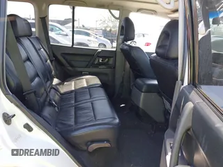 2003 Mitsubishi Montero Limited z VIN JA4NW51S43J017989, wystawiony jako IAAI lot #41963880 z przebiegiem 161 443 mil mil oraz . Historia ofert i sprzedaży dostępna na DreamBid. Obrazek 8.