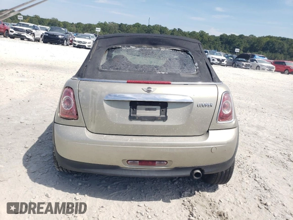 2011 MINI Convertible with VIN WMWZN3C54BT133246, listed as a Copart auction lot 69780074 with 176,955 mi miles and Salvage title. Bid and sale history available at DreamBid. Image 6.