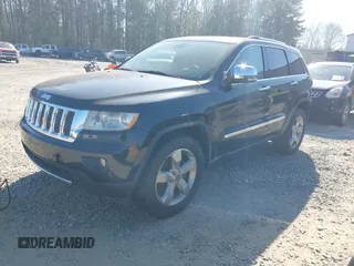 2013 Jeep Grand Cherokee Overland with VIN 1C4RJECG7DC644822, listed as a IAAI auction lot 41658872 with 156,838 mi miles. Bid and sale history available at carsss.com. Image 18.