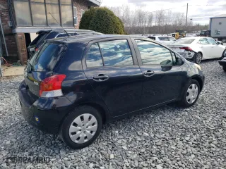 2009 Toyota Yaris with VIN JTDKT903395225334, listed as a Copart auction lot 50764035 with 117,561 mi miles and Clean Title. Bid and sale history available at carsss.com. Image 3.
