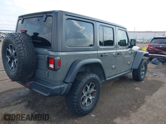 2020 Jeep Wrangler Unlimited Rubicon z VIN 1C4HJXFG7LW193665, wystawiony jako IAAI lot #41874930 z przebiegiem 58 884 mil mil oraz . Historia ofert i sprzedaży dostępna na DreamBid. Obrazek 4.