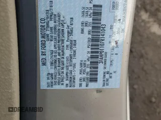 2007 Ford Fusion SE with VIN 3FAHP01107R141043, listed as a Copart auction lot 52027495 with 101,170 mi miles and Salvage Title. Bid and sale history available at carsss.com. Image 12.