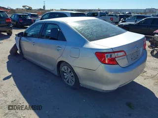 2014 Toyota Camry L with VIN 4T1BF1FK7EU856848, listed as a IAAI auction lot 41729604 with 100,148 mi miles. Bid and sale history available at carsss.com. Image 3.