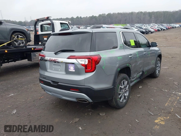 2023 GMC Acadia SLT with VIN 1GKKNML48PZ156202, listed as a IAAI auction lot 41526629 with 29,460 mi miles and . Bid and sale history available at DreamBid. Image 4.
