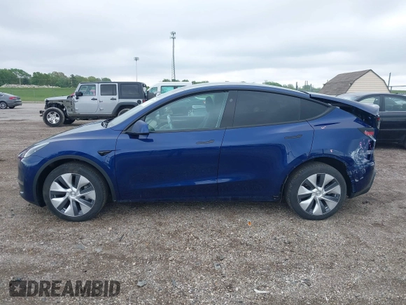2023 Tesla Model Y Long Range z VIN 7SAYGDEE0PF840787, wystawiony jako IAAI lot #42172489 z przebiegiem 16 314 mil mil oraz . Historia ofert i sprzedaży dostępna na DreamBid. Obrazek 15.