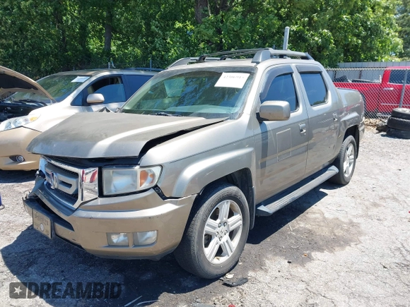 2011 Honda Ridgeline RTL with VIN 5FPYK1F57BB452321, listed as a IAAI auction lot 42306915 with Not provided miles and . Bid and sale history available at DreamBid. Image 2.