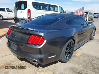 2015 Ford Mustang V6 with VIN 1FA6P8AM5F5318400, listed as a IAAI auction lot 41812625 with 97,728 mi miles and . Bid and sale history available at DreamBid. Image 4.