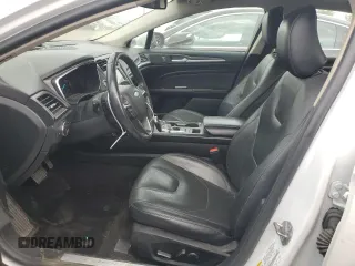 2020 Ford Fusion Titanium with VIN 3FA6P0D96LR173756, listed as a Copart auction lot 56467885 with 77,217 mi miles and Salvage title. Bid and sale history available at DreamBid. Image 7.