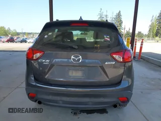 2016 Mazda CX-5 Sport with VIN JM3KE4BY1G0910102, listed as a IAAI auction lot 42115163 with 144,495 mi miles and . Bid and sale history available at carsss.com. Image 17.