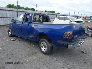 1998 Ford F-150 XL with VIN 2FTZX0722WCA65198, listed as a IAAI auction lot 42145451 with 188,529 mi miles and . Bid and sale history available at DreamBid. Image 3.
